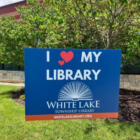 I love my Library sign outdoors near trees