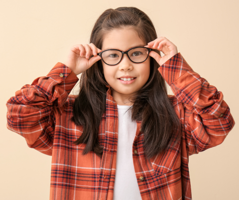 young girl wearing glasses